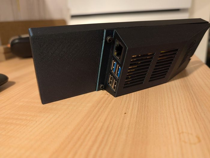 Printed enclosure back with CM5 I/O ports